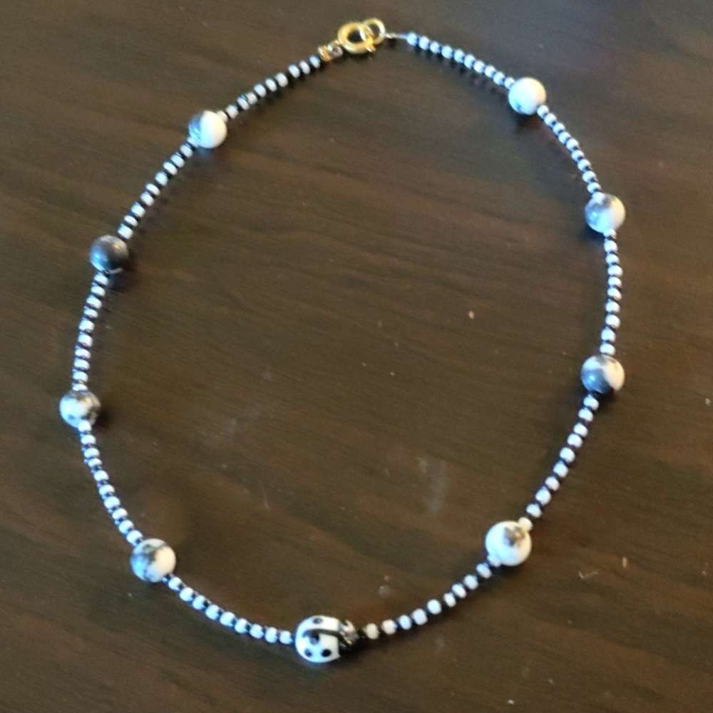 Black and white ladybug necklace